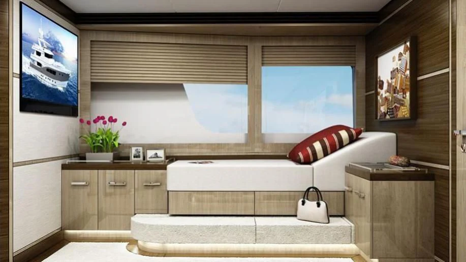 a room with a bed and a television aboard ST DAVID Yacht for Sale
