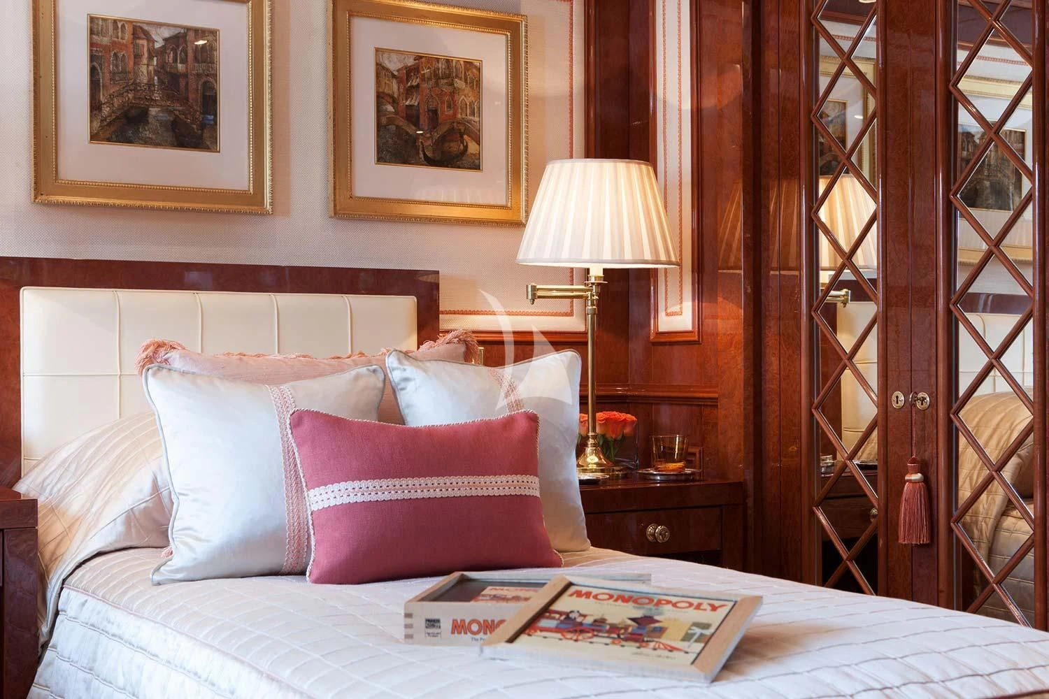 a bed with pillows and a lamp aboard ST DAVID Yacht for Sale