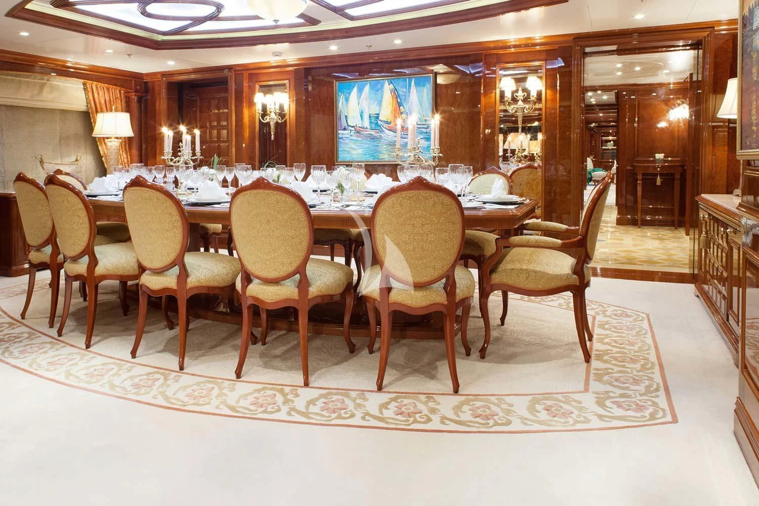 a table with chairs around it aboard ST DAVID Yacht for Sale