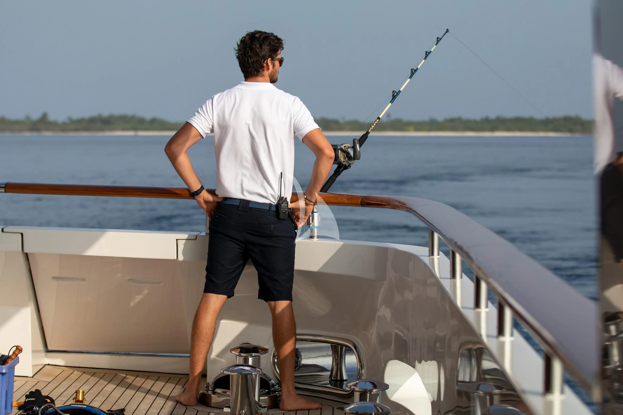 a man standing on a boat aboard ST DAVID Yacht for Sale