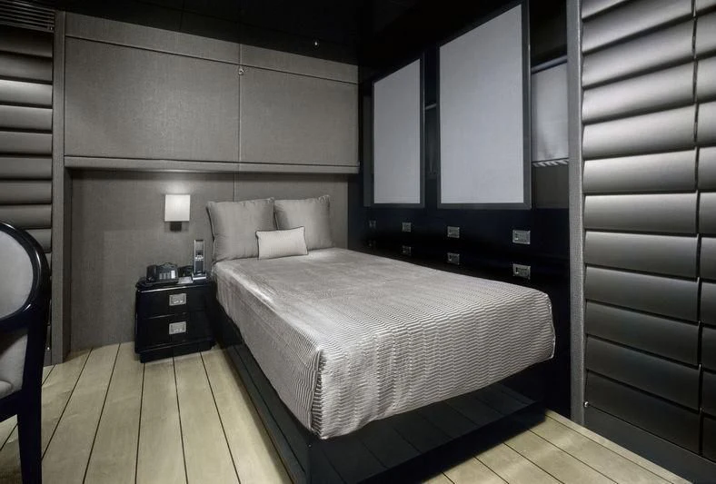 a bed in a room aboard MAIN Yacht for Sale