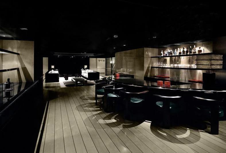 a large kitchen with a large bar aboard MAIN Yacht for Sale