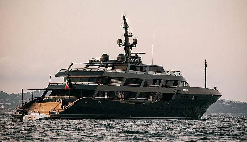 a large ship in the water aboard MAIN Yacht for Sale