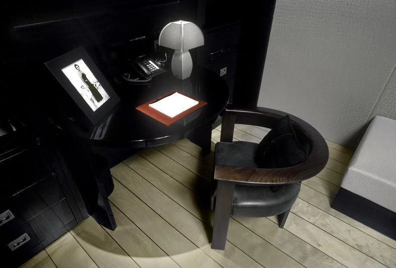a chair in a room aboard MAIN Yacht for Sale