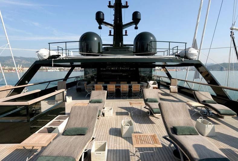 a large military ship aboard MAIN Yacht for Sale