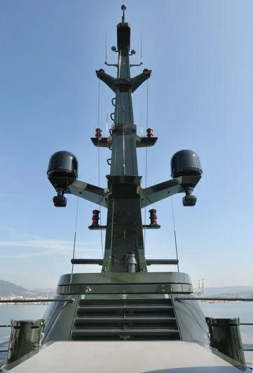 a large metal ship on a dock aboard MAIN Yacht for Sale