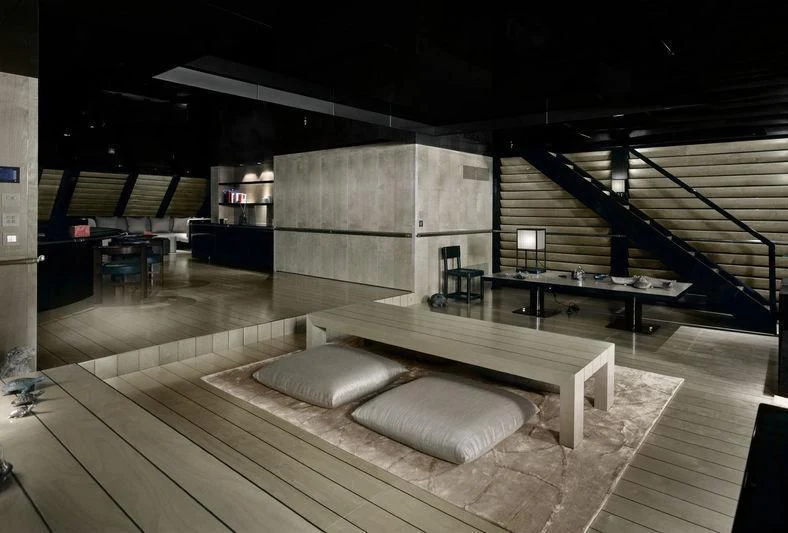 a room with a couch and a table aboard MAIN Yacht for Sale
