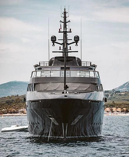 a large ship in the water aboard MAIN Yacht for Sale