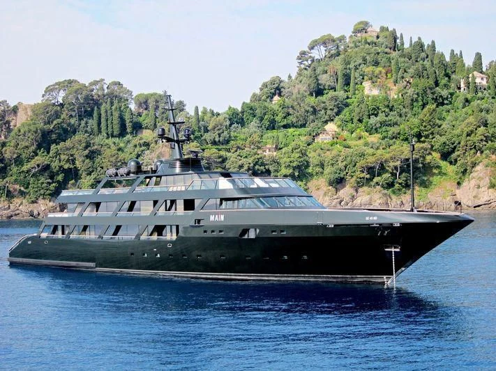 a large ship in the water aboard MAIN Yacht for Sale