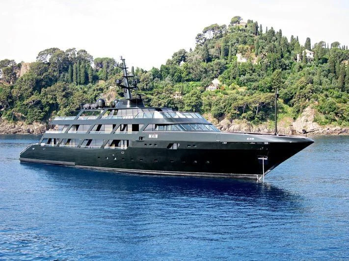 a large ship in the water aboard MAIN Yacht for Sale