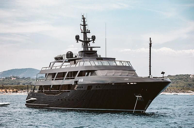 a large ship in the water aboard MAIN Yacht for Sale