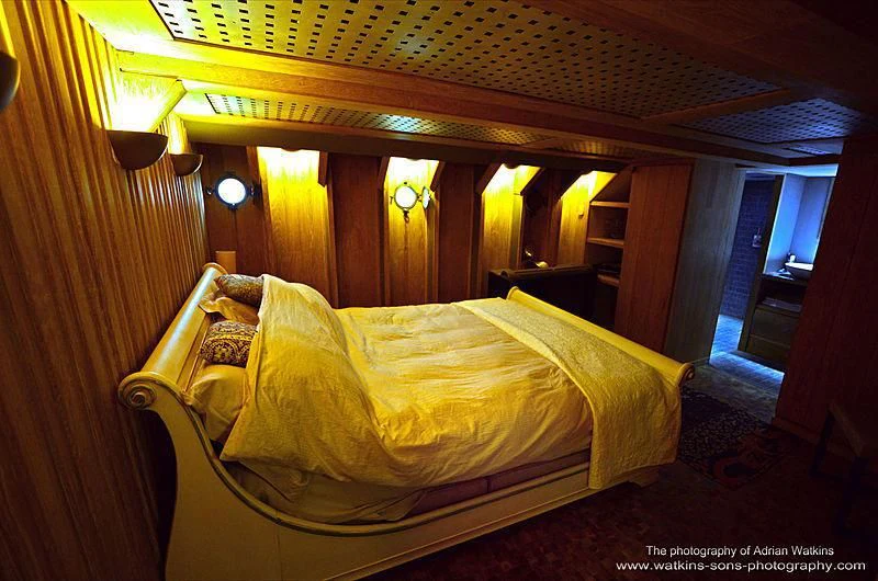 a bed in a room aboard MOJO Yacht for Sale