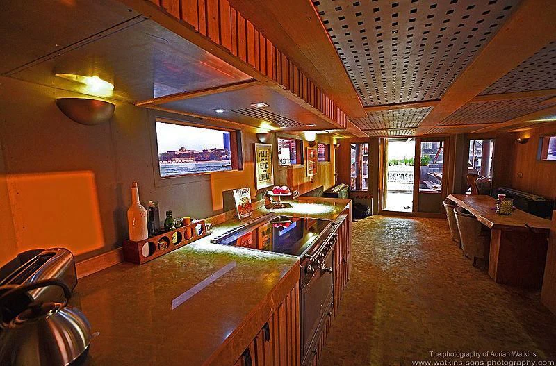 a bar with a bar and bar aboard MOJO Yacht for Sale