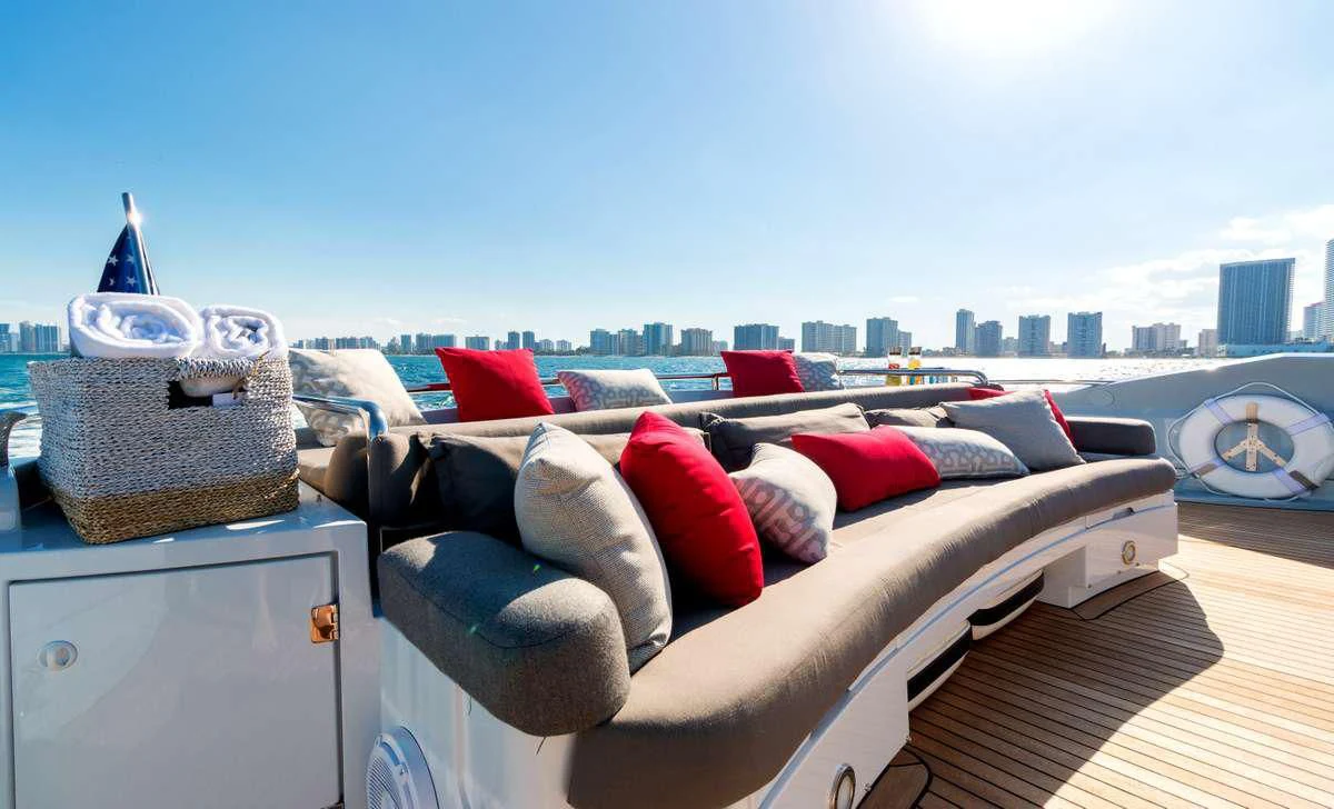 a bed with pillows and pillows aboard PRIVEE Yacht for Sale