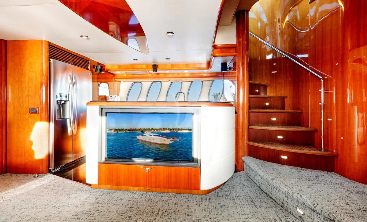 a fireplace in a room aboard PRIVEE Yacht for Sale