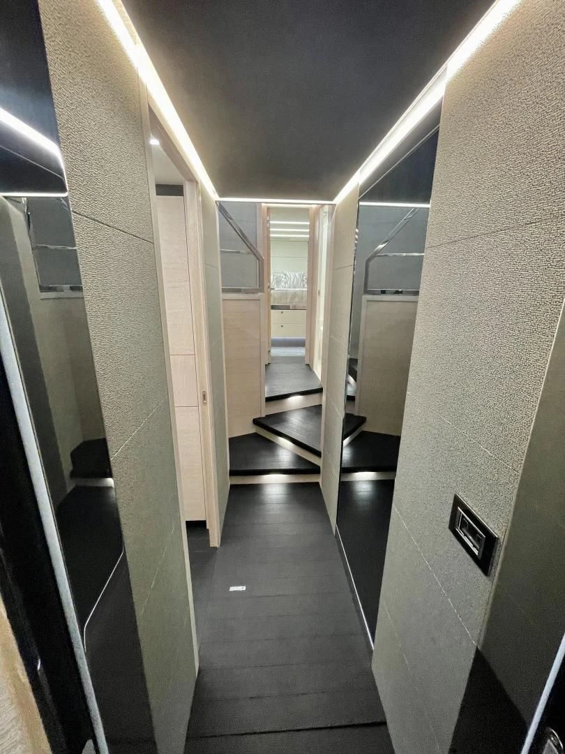 a hallway with doors aboard AGRODOLCE Yacht for Sale