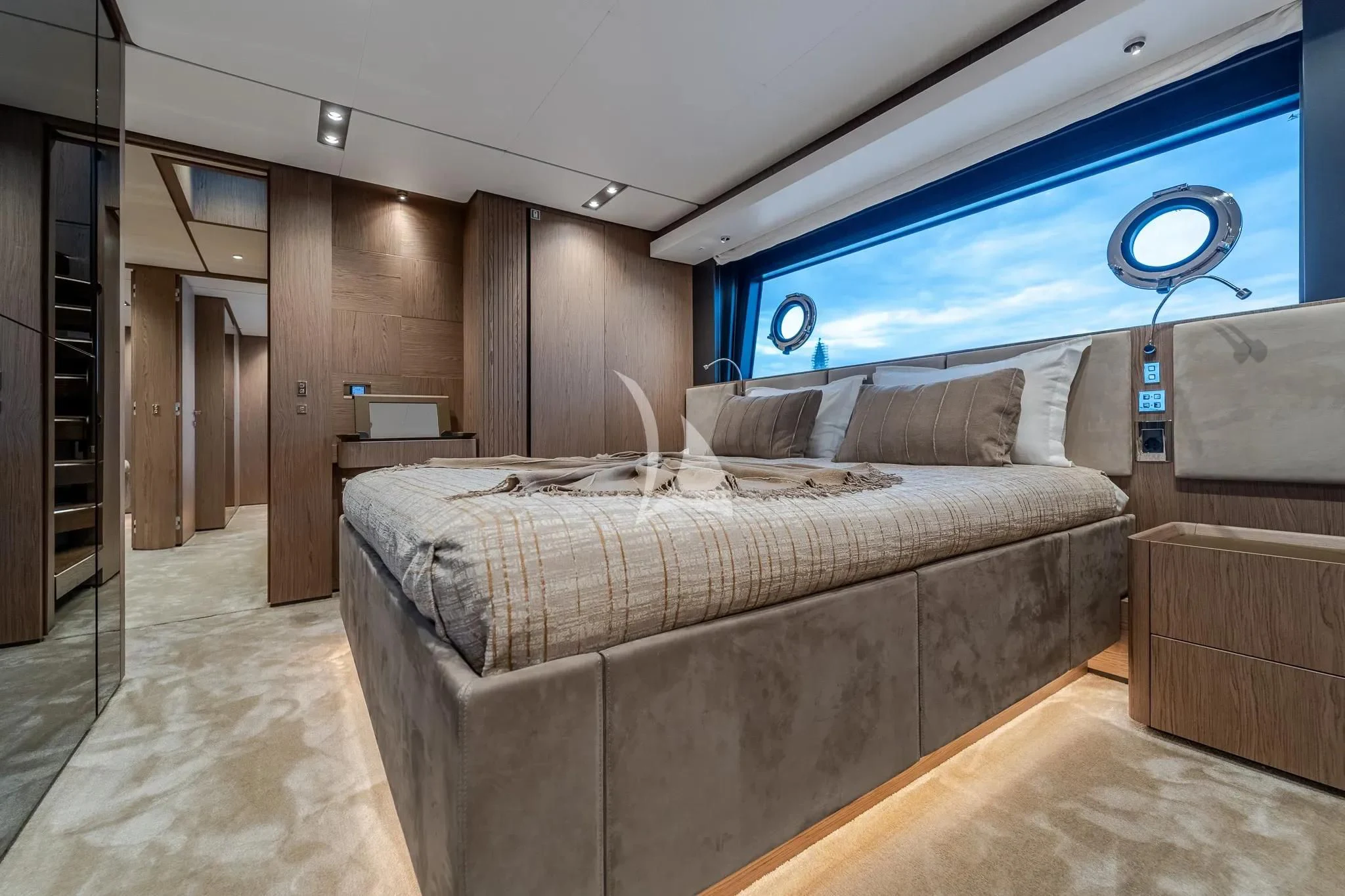 a bed in a room aboard DAMARI Yacht for Charter