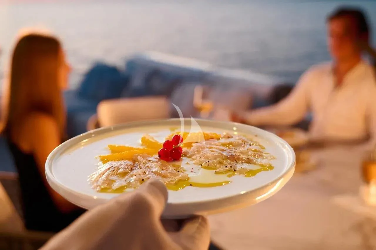a plate of food aboard DAMARI Yacht for Charter