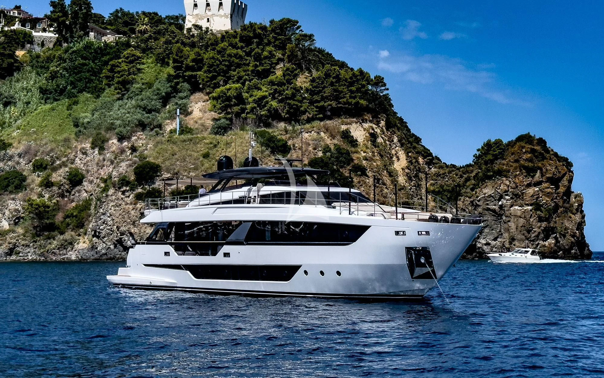 a white boat on the water aboard DAMARI Yacht for Charter