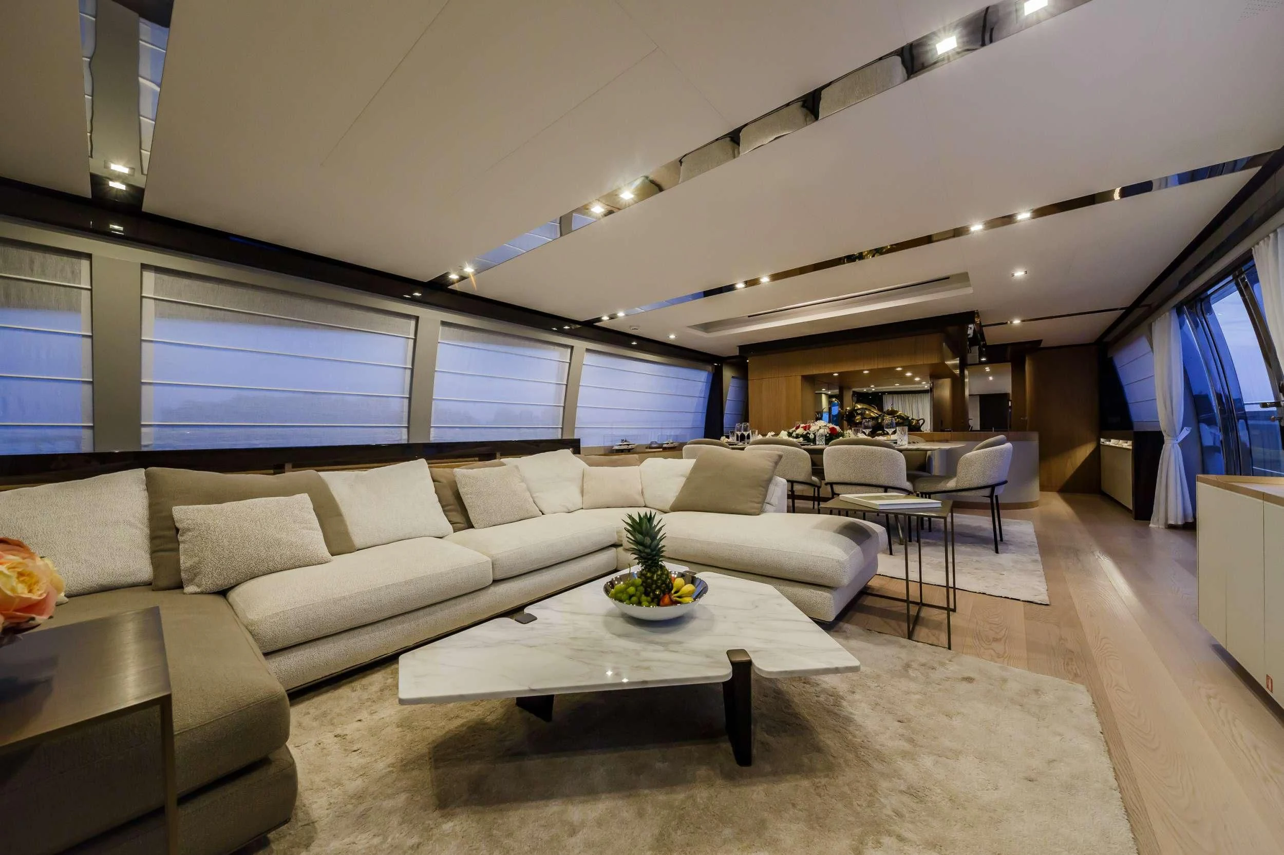 a living room with a couch and a table aboard DAMARI Yacht for Charter