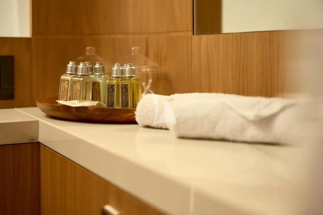 a counter with a tray of food and a plate of food aboard DAMARI Yacht for Charter