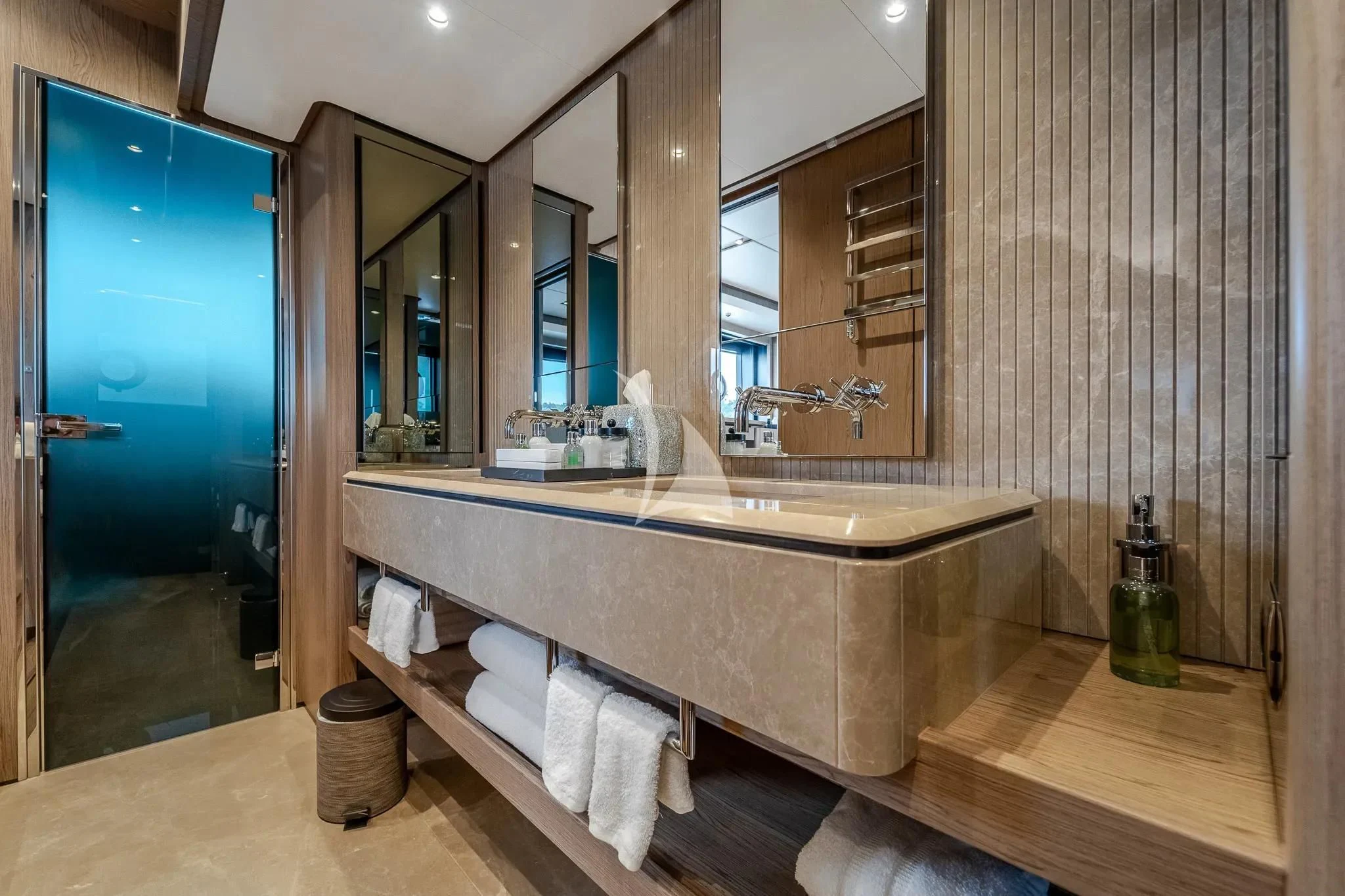 a bathroom with a large countertop aboard DAMARI Yacht for Charter