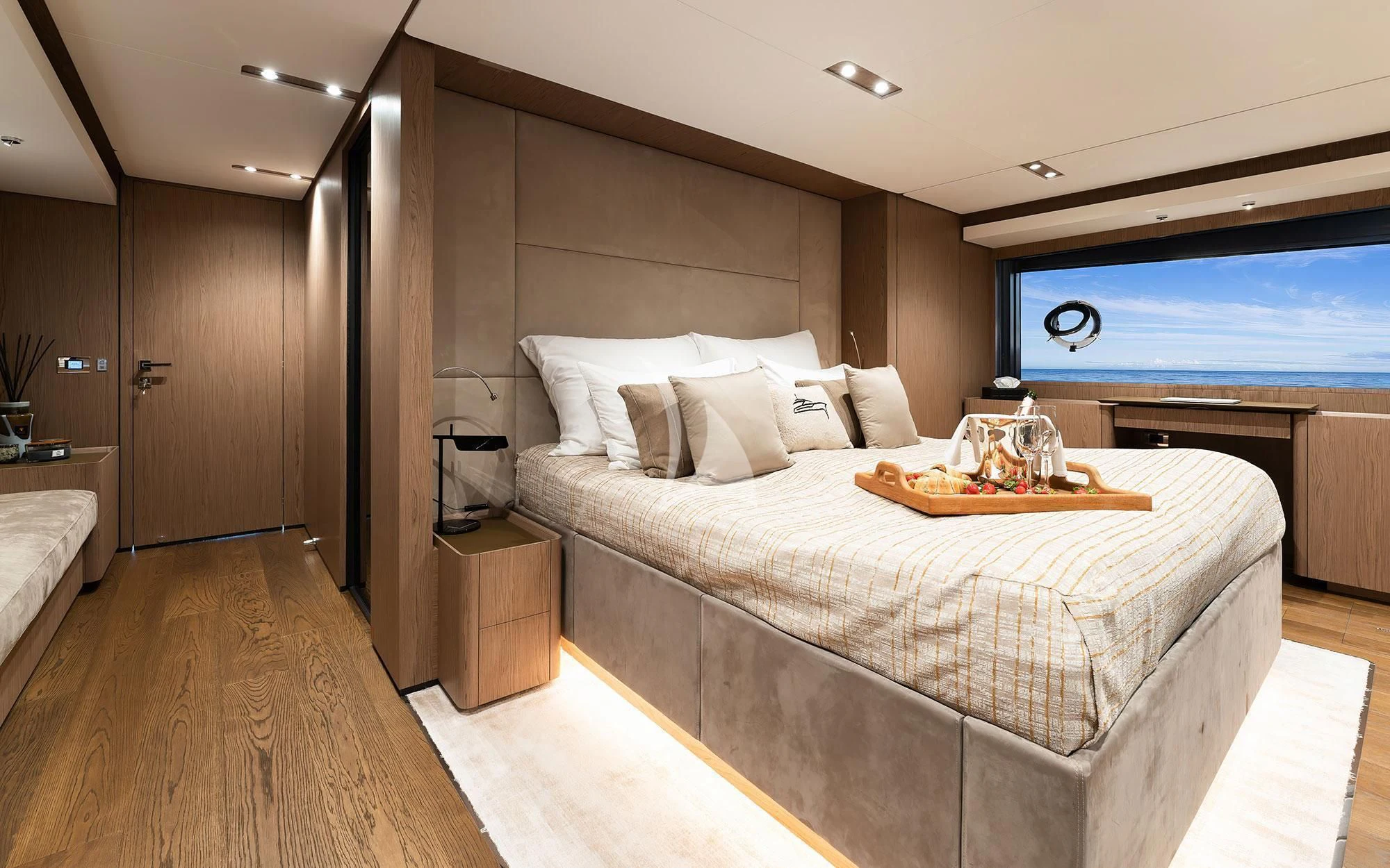 a large bed in a room aboard DAMARI Yacht for Charter