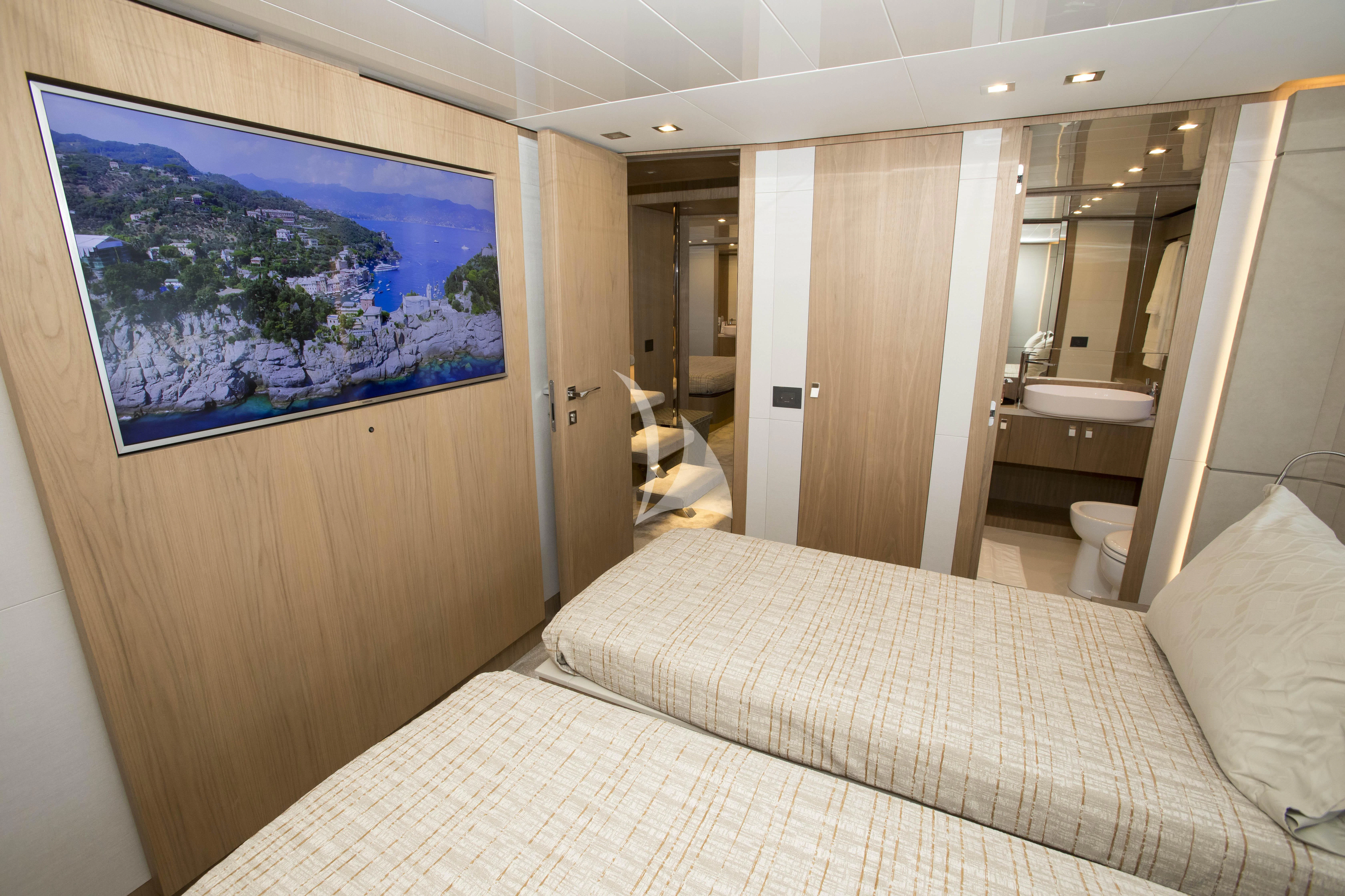 a bed in a room aboard DAMARI Yacht for Charter