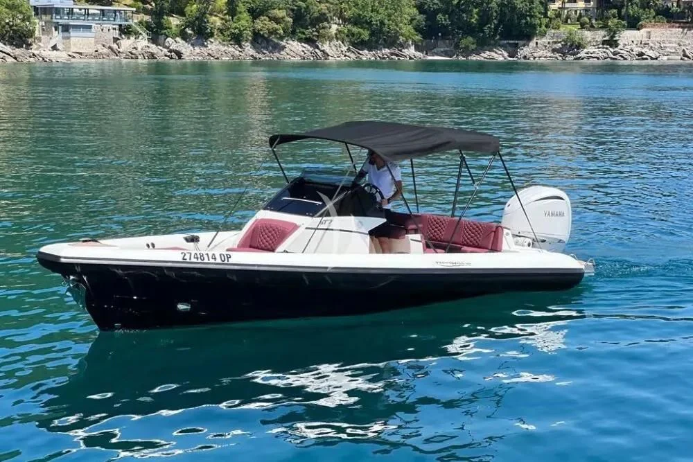 a person in a boat aboard DAMARI Yacht for Charter