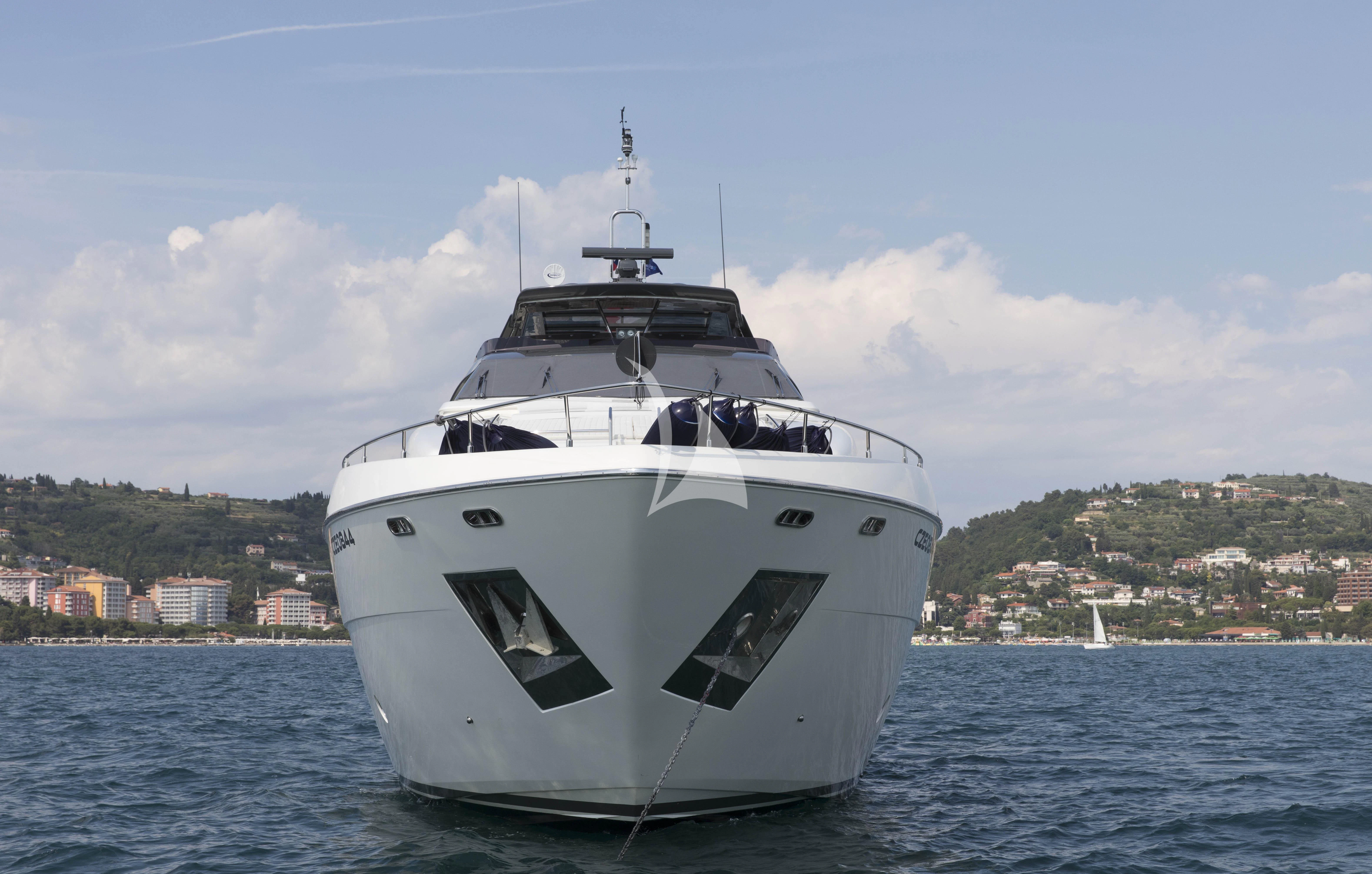 a white boat on the water aboard DAMARI Yacht for Charter
