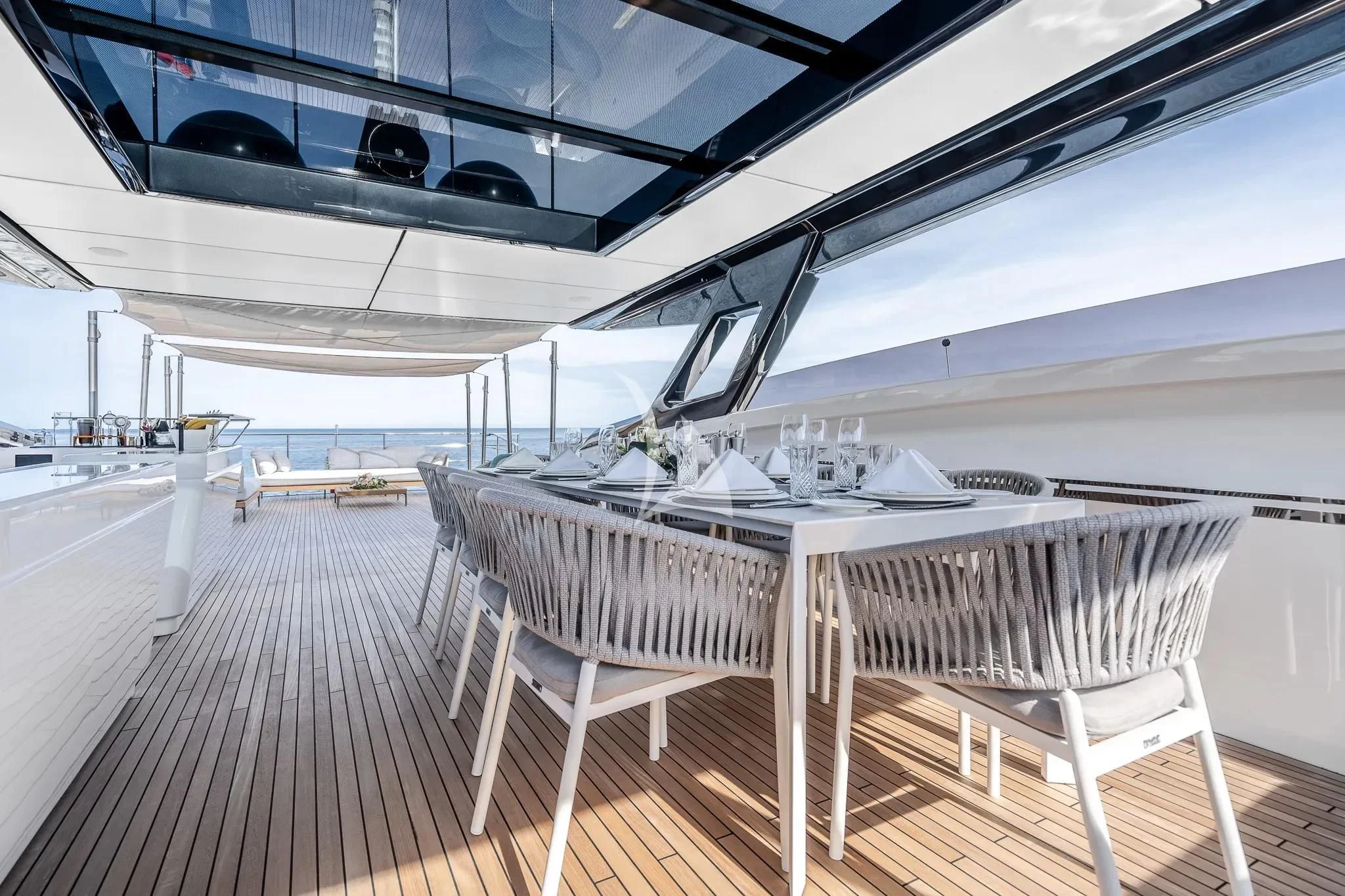 a row of white yachts aboard DAMARI Yacht for Charter