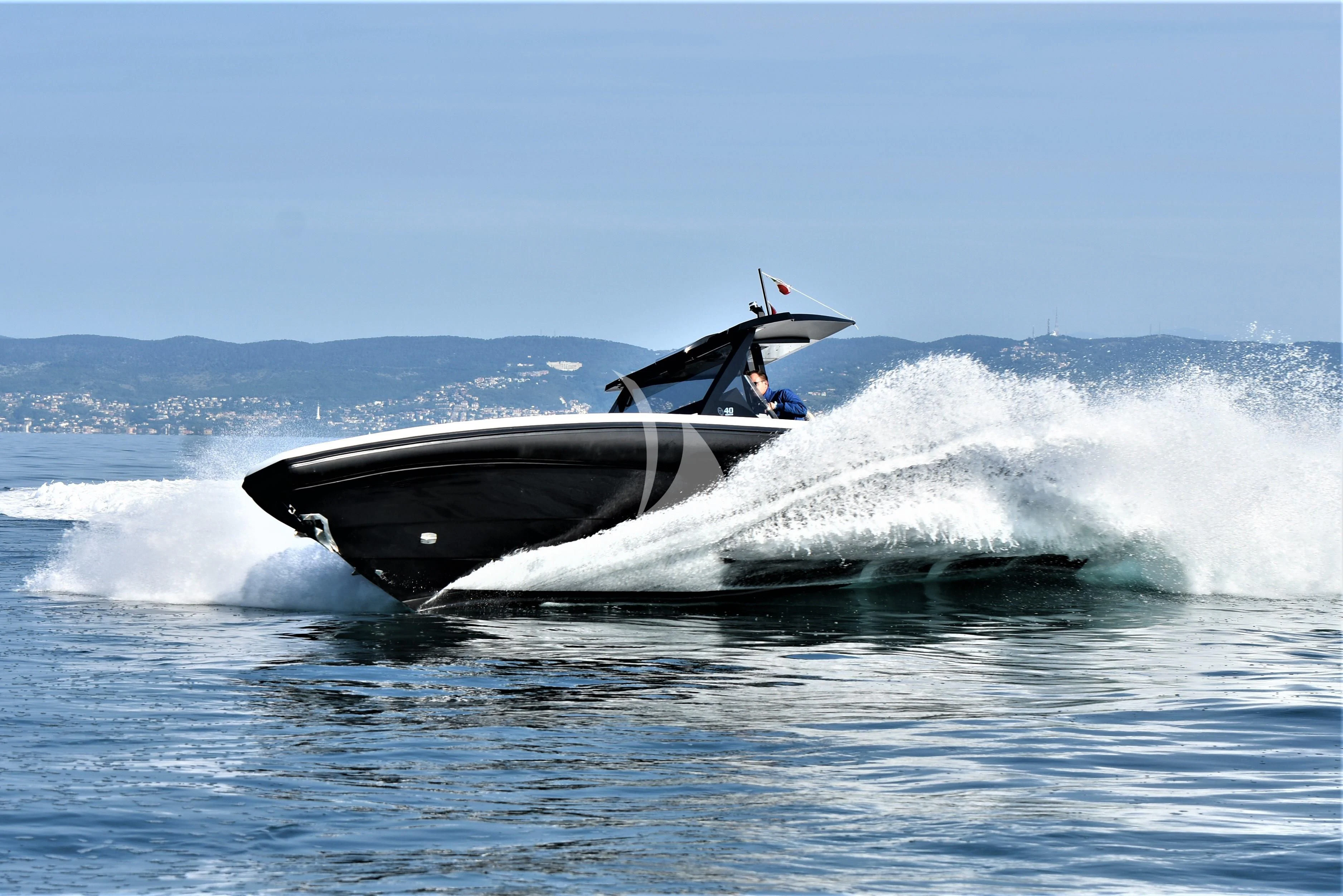 a boat with a person in it aboard DAMARI Yacht for Charter