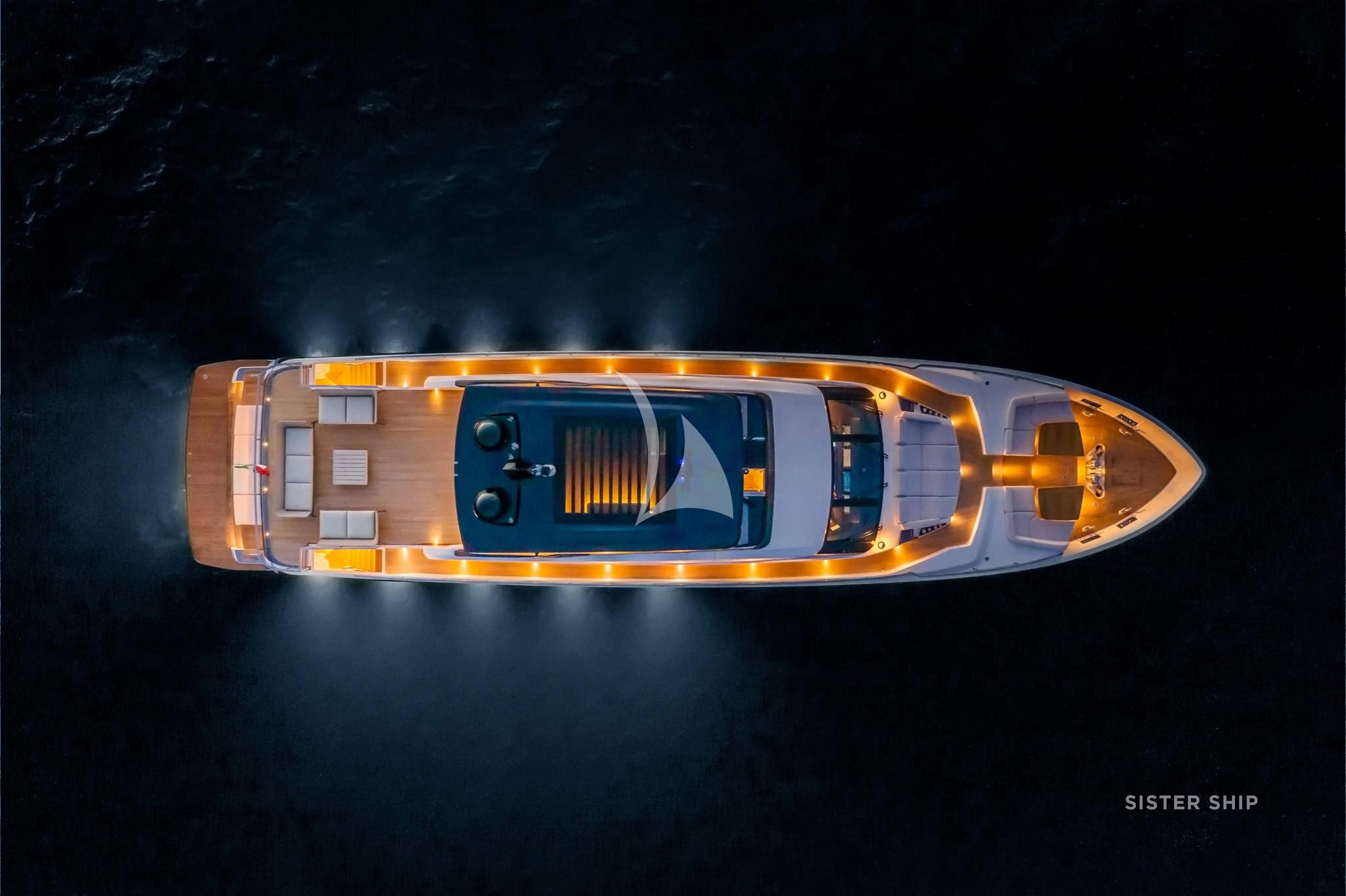 a yellow and silver vehicle with a blue background aboard DAMARI Yacht for Charter