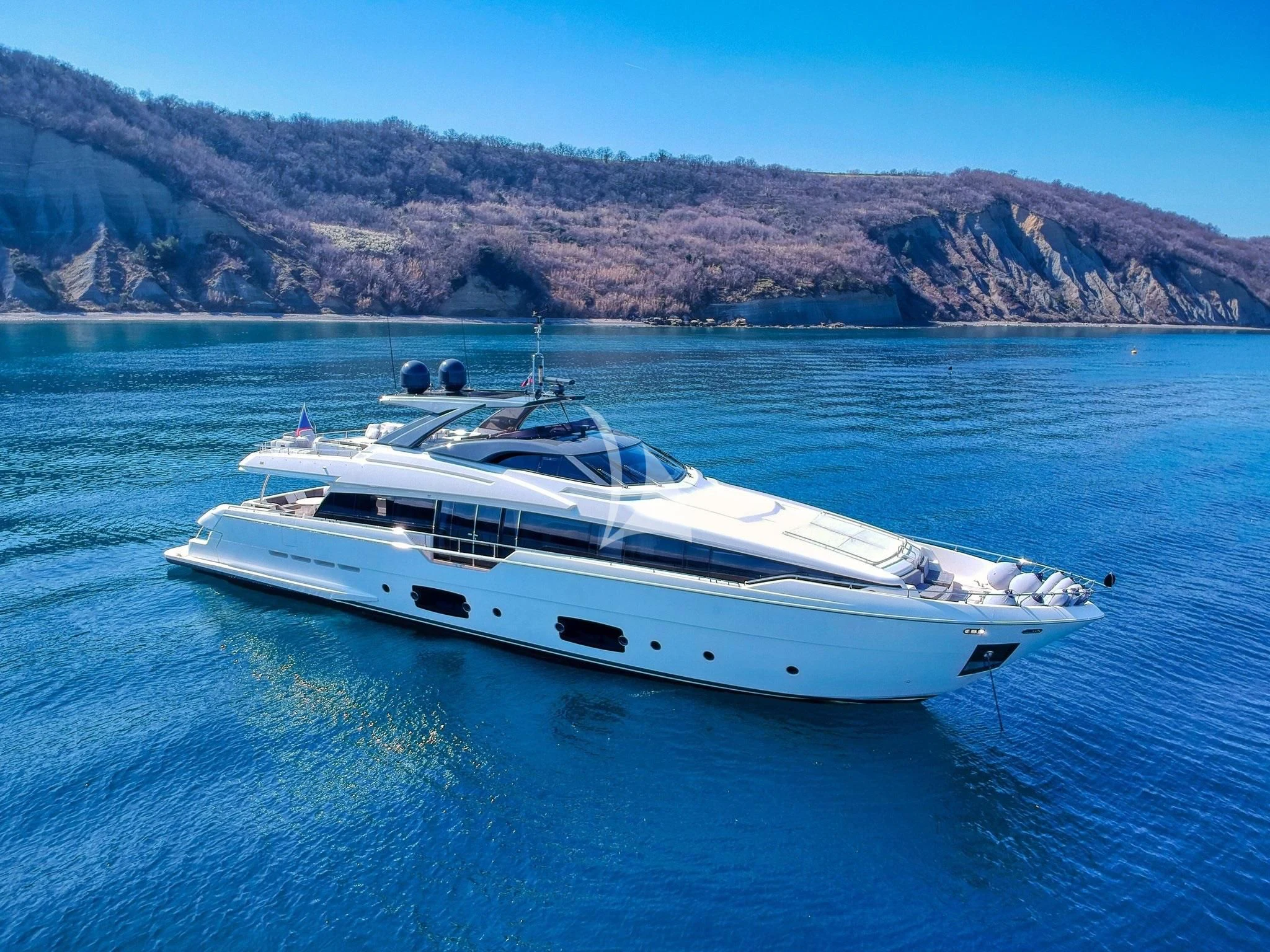 a white yacht in the water aboard DAMARI Yacht for Charter