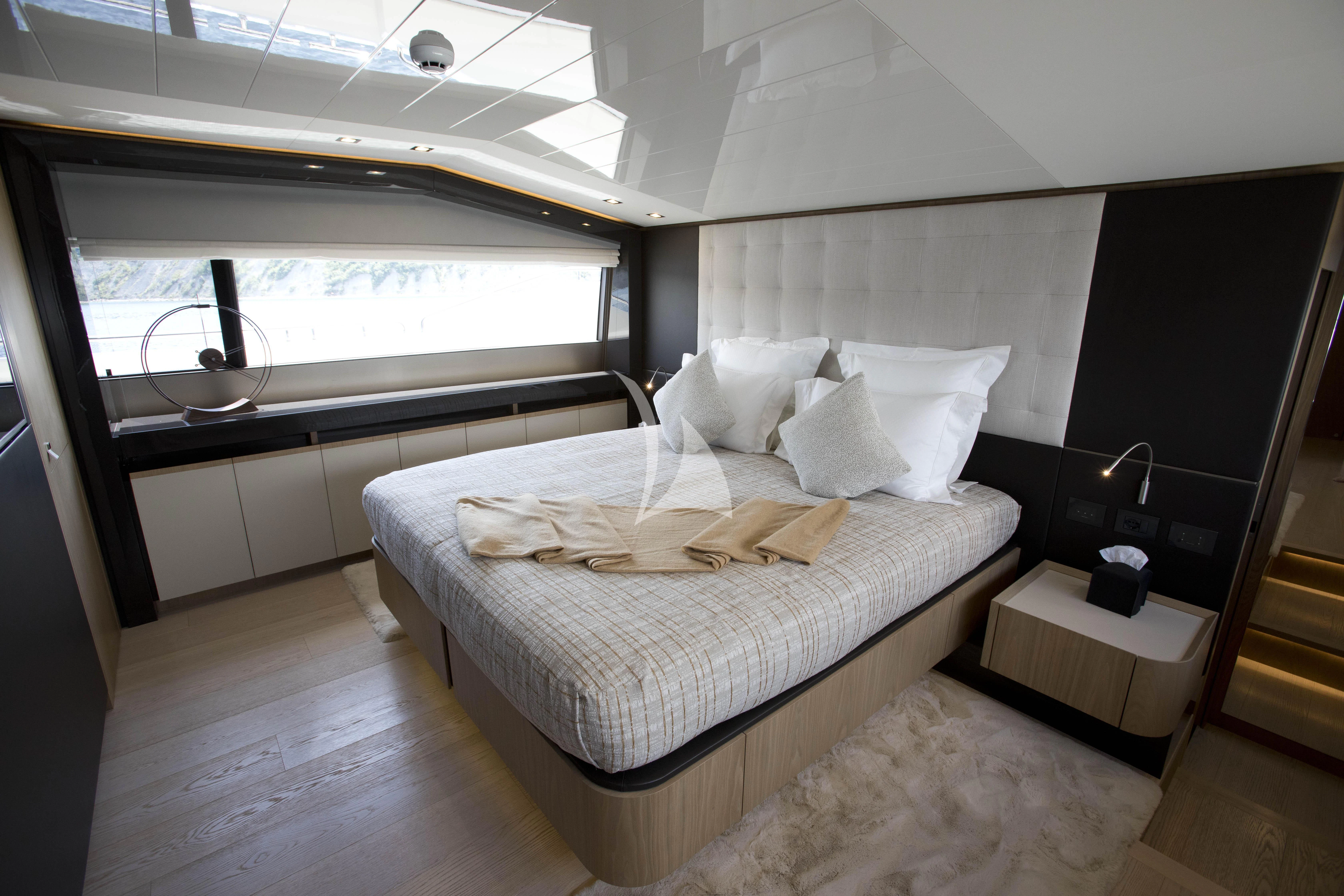 a bed in a room aboard DAMARI Yacht for Charter