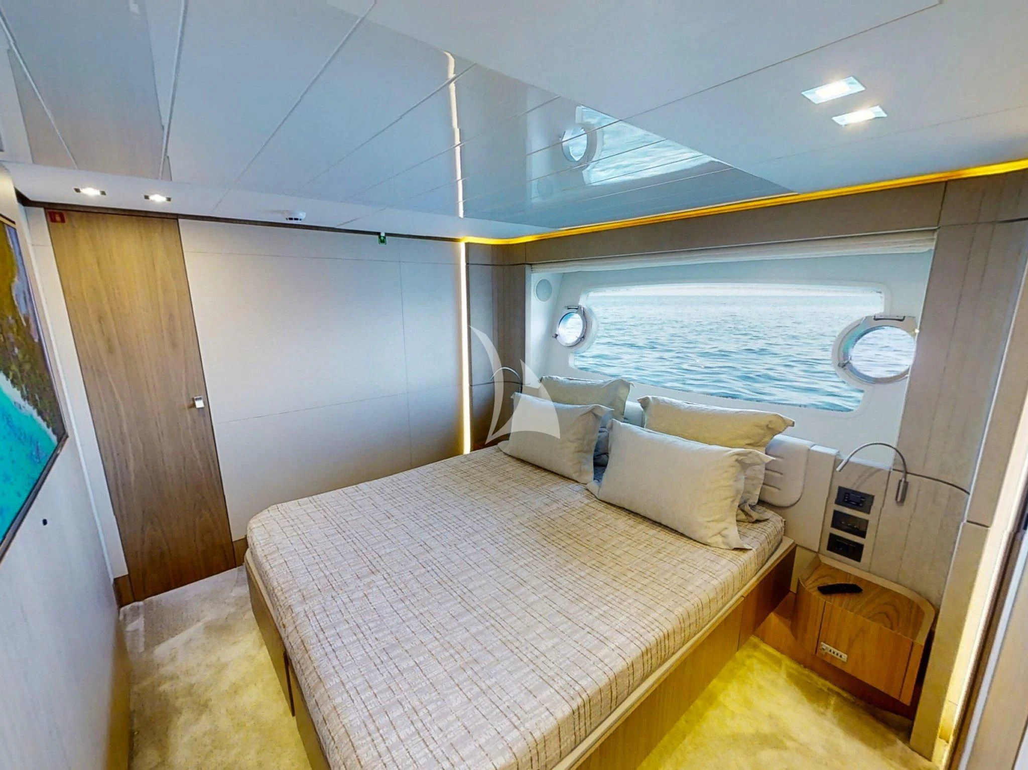 a bed in a room aboard DAMARI Yacht for Charter