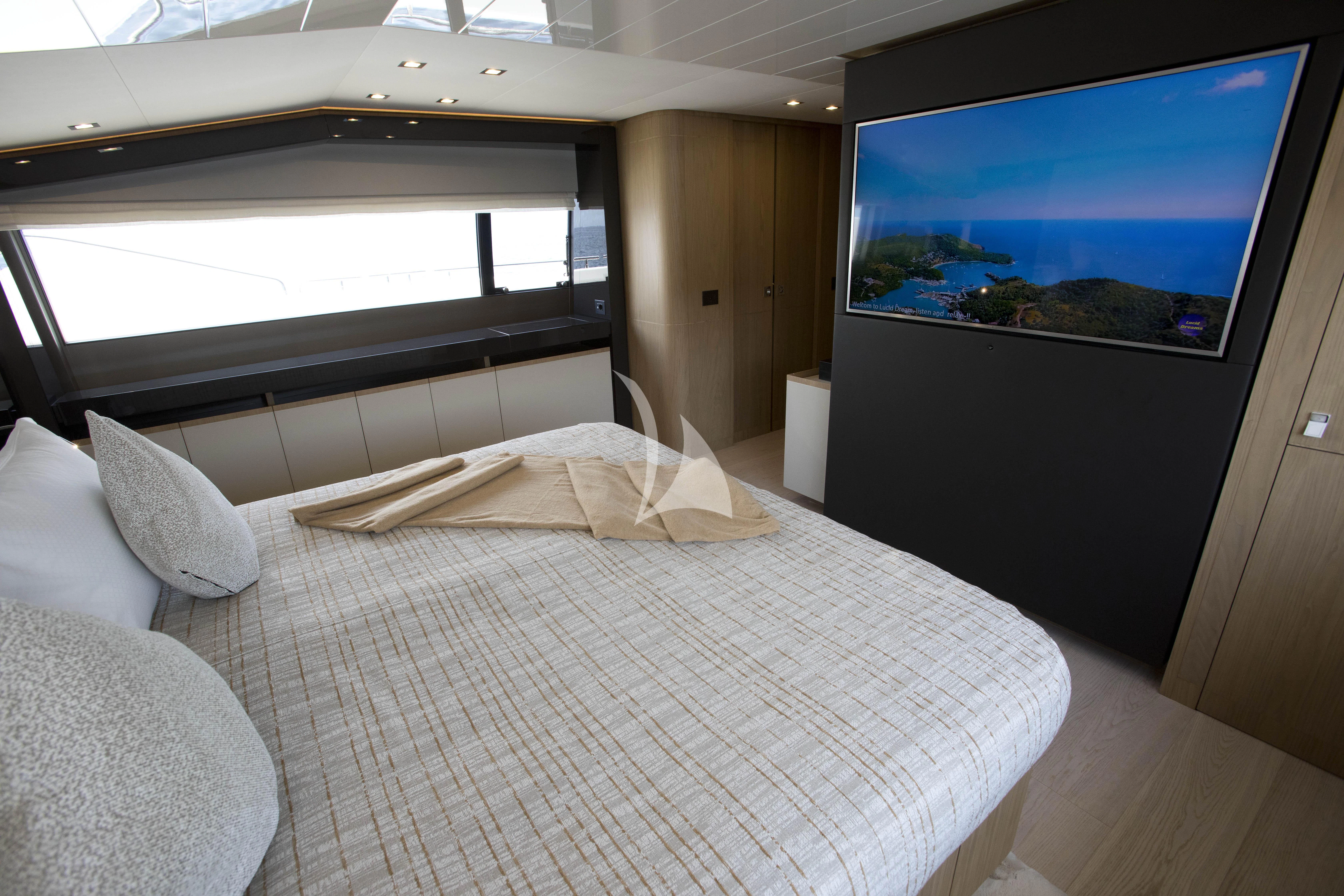 a bed in a room aboard DAMARI Yacht for Charter