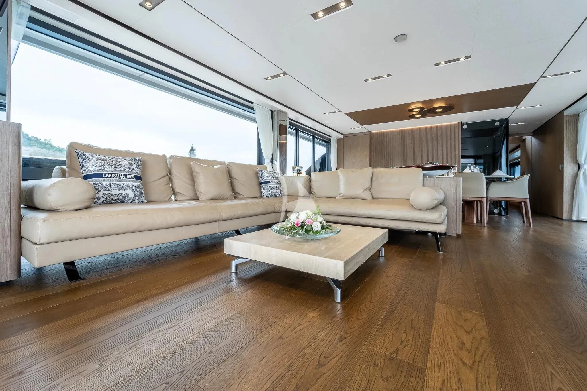 a living room with a couch and a table aboard DAMARI Yacht for Charter