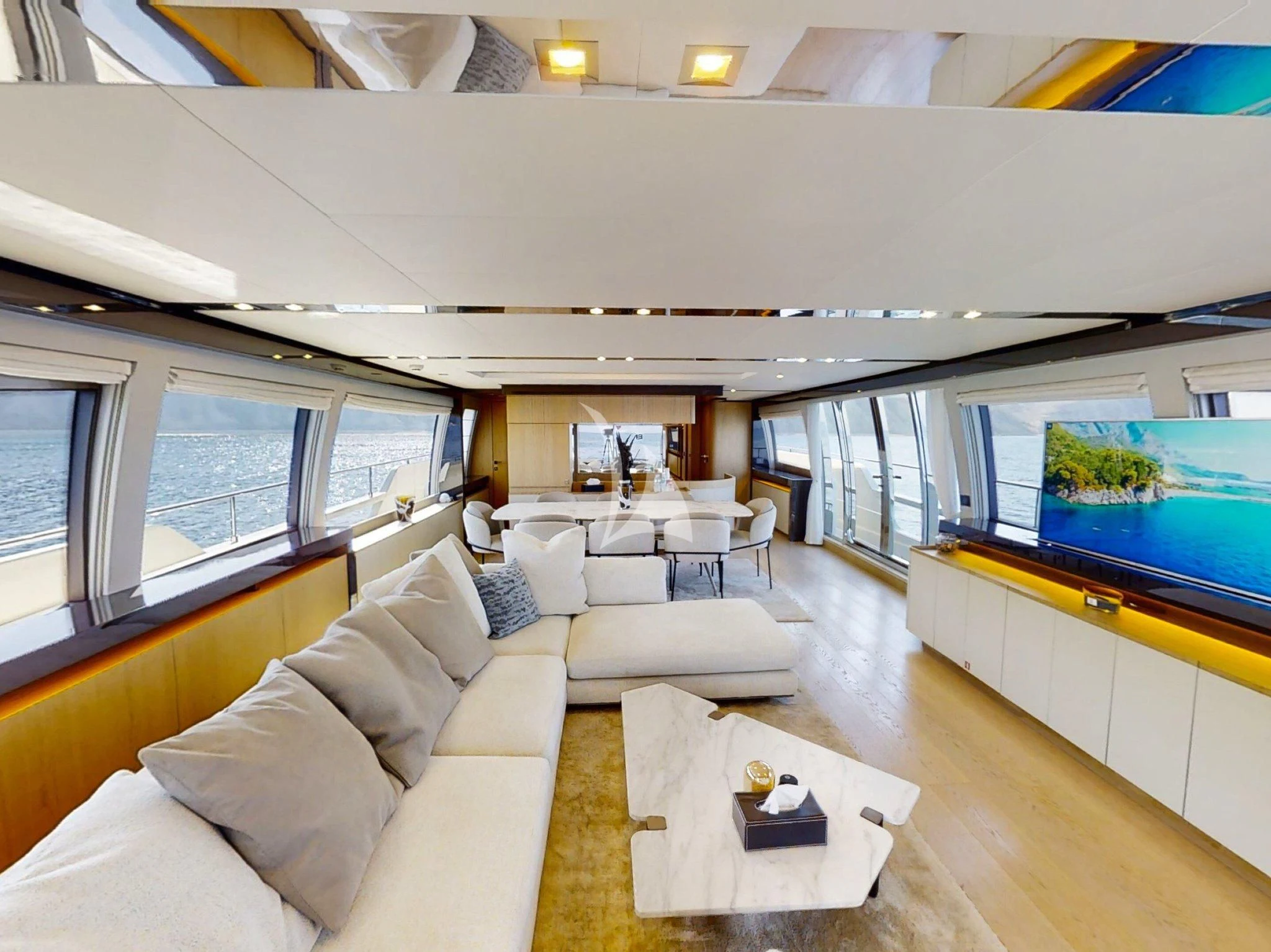 a room with a couch and a table aboard DAMARI Yacht for Charter