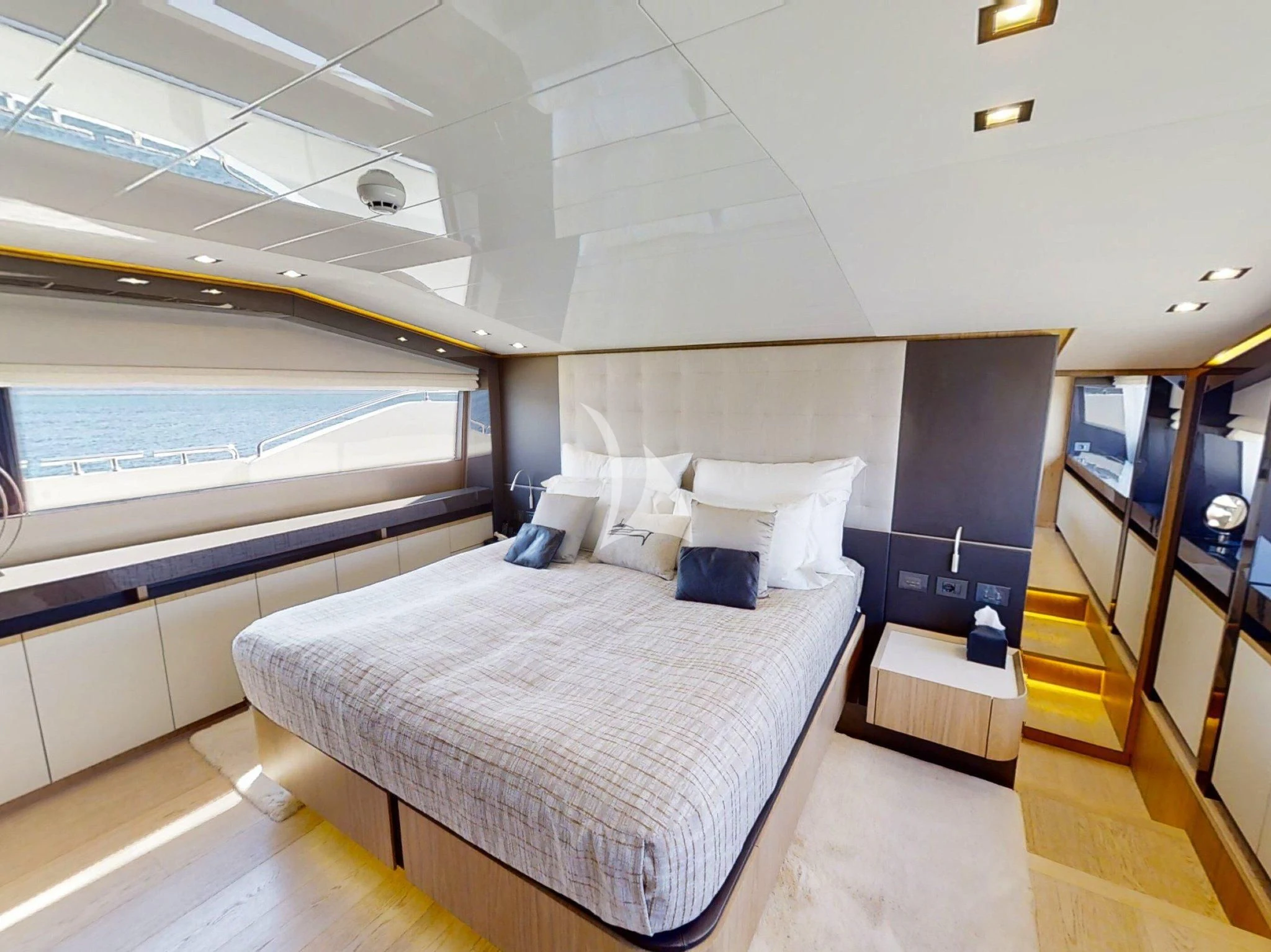 a bed in a room aboard DAMARI Yacht for Charter