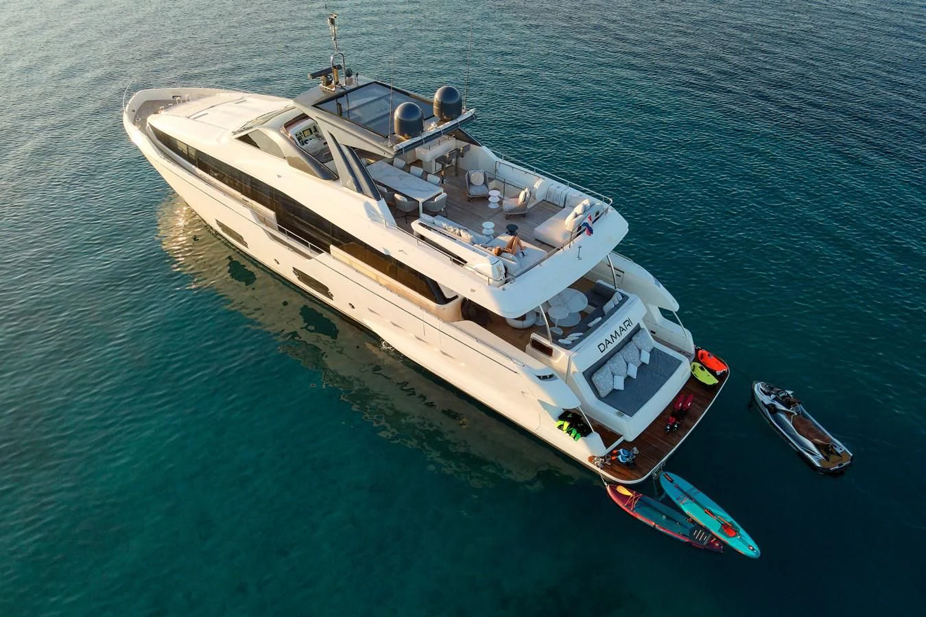 a large ship in the water aboard DAMARI Yacht for Charter