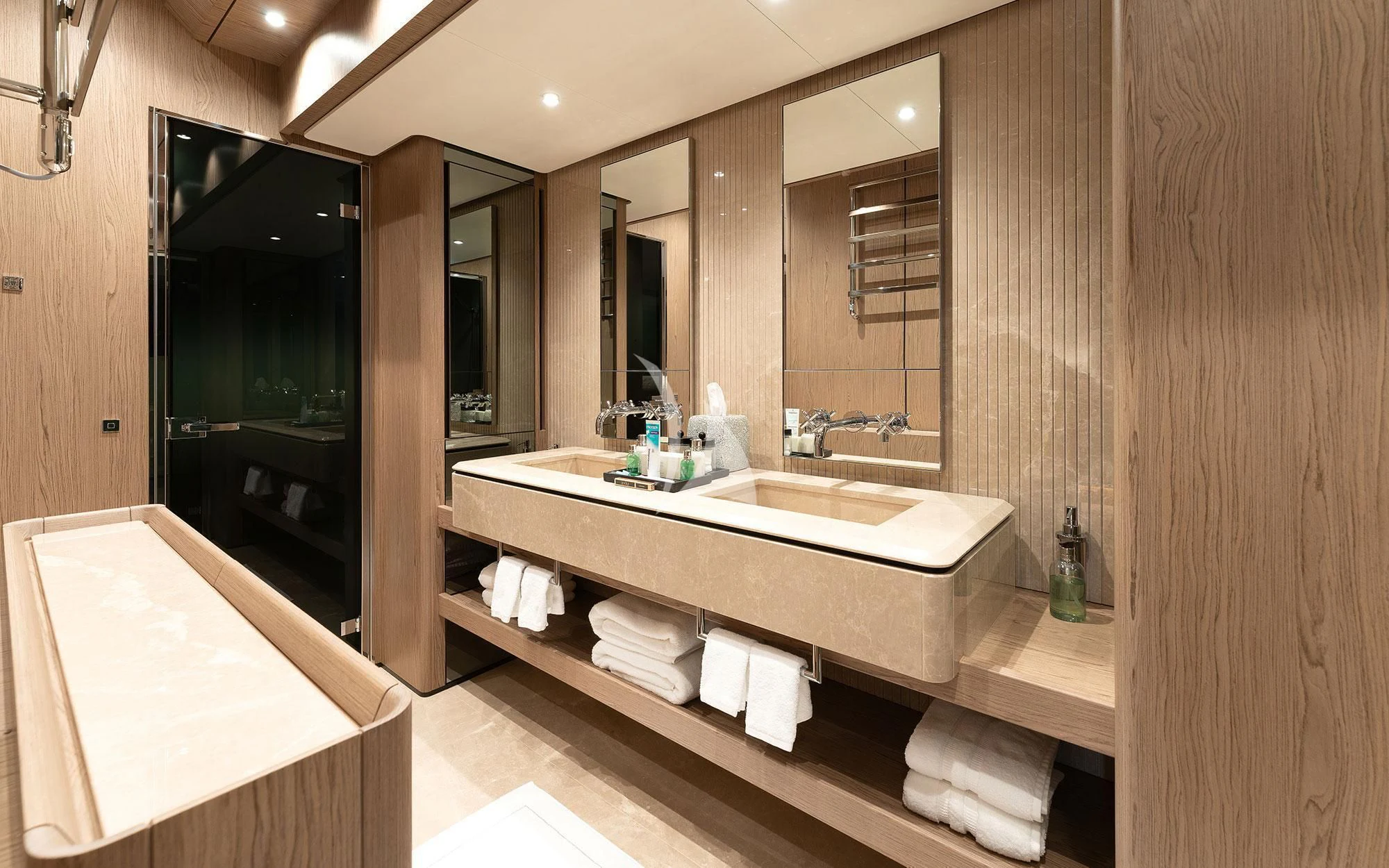 a bathroom with sinks and mirrors aboard DAMARI Yacht for Charter