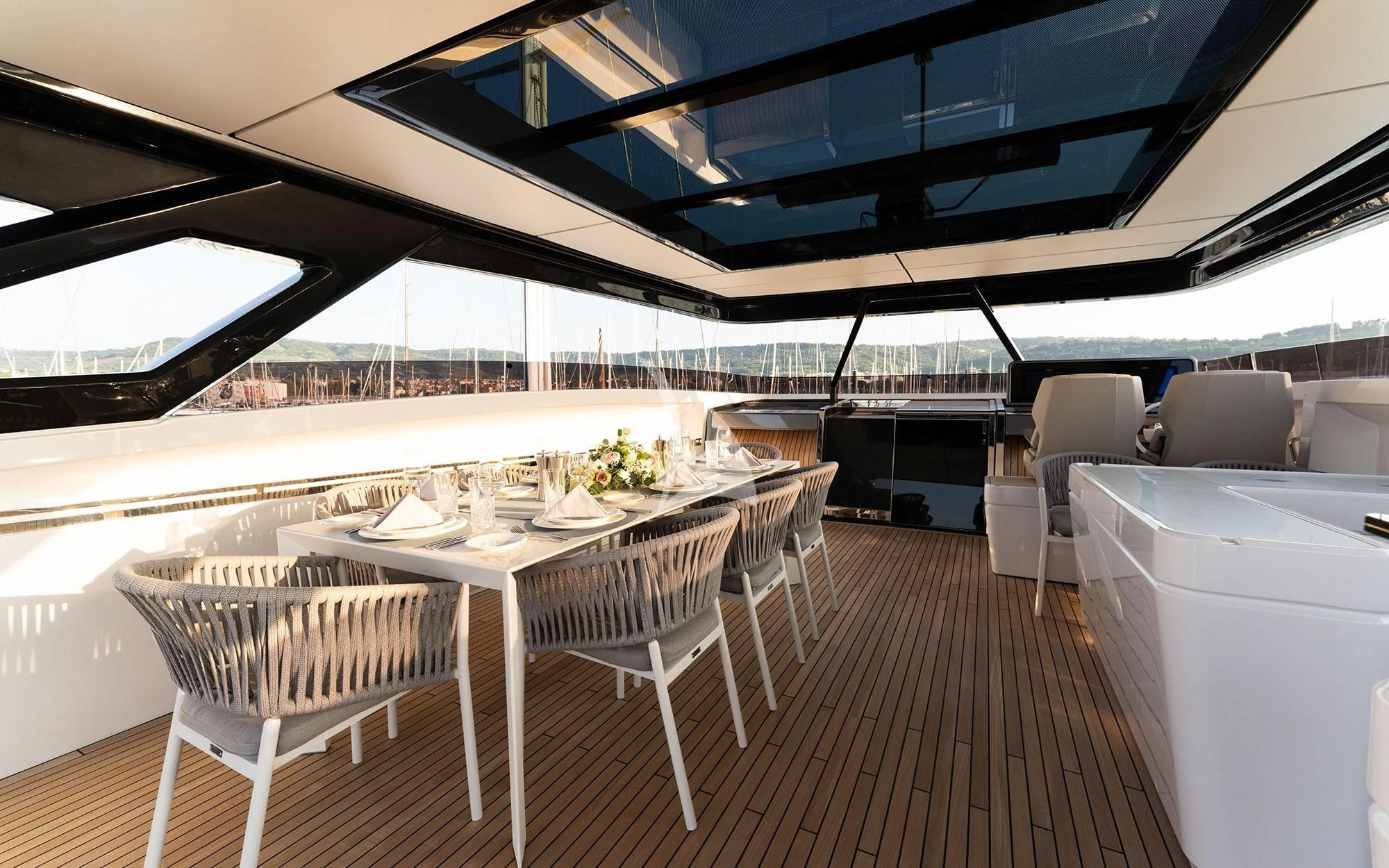 a room with a table and chairs aboard DAMARI Yacht for Charter