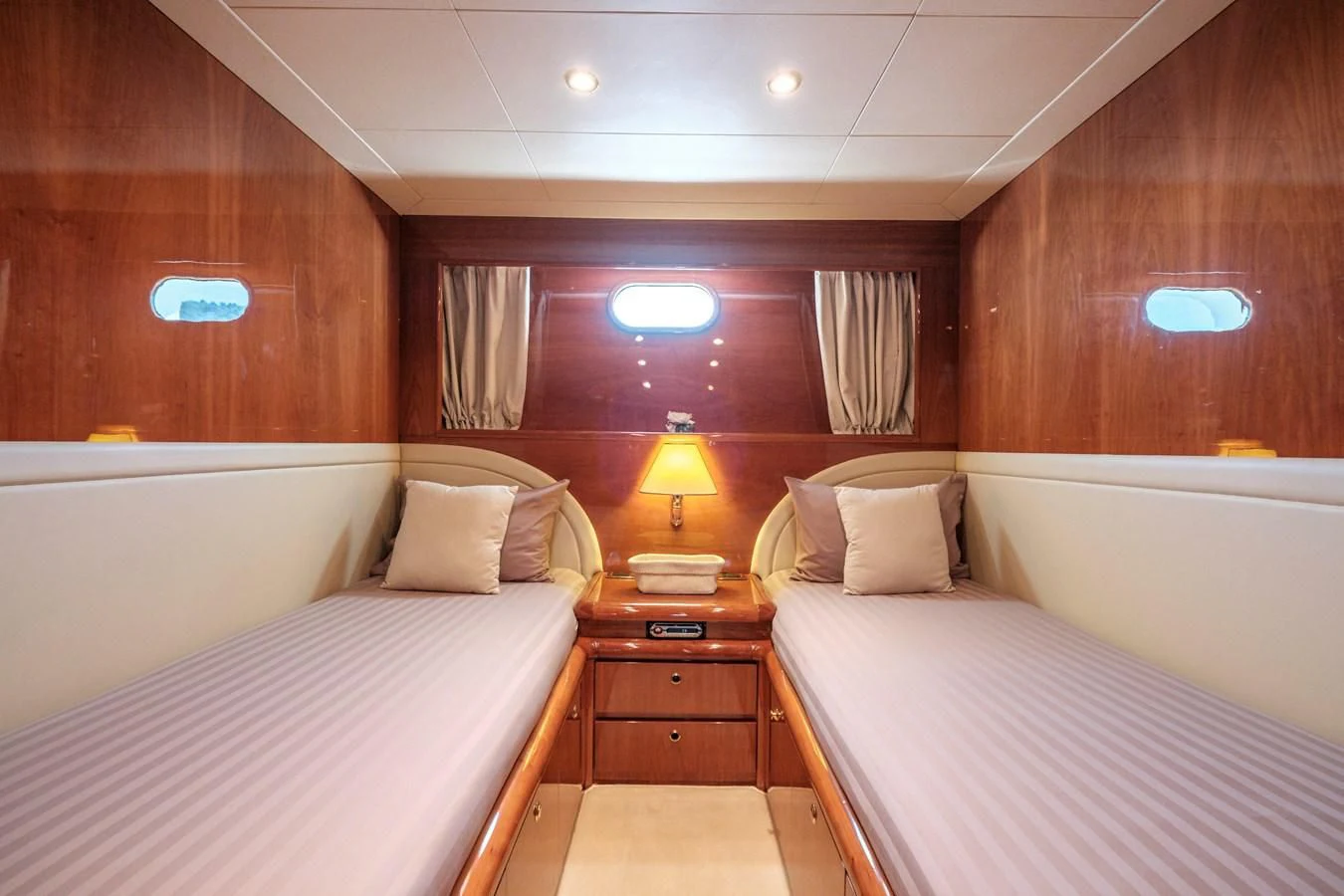 a room with two beds aboard BEIJA FLORE Yacht for Charter