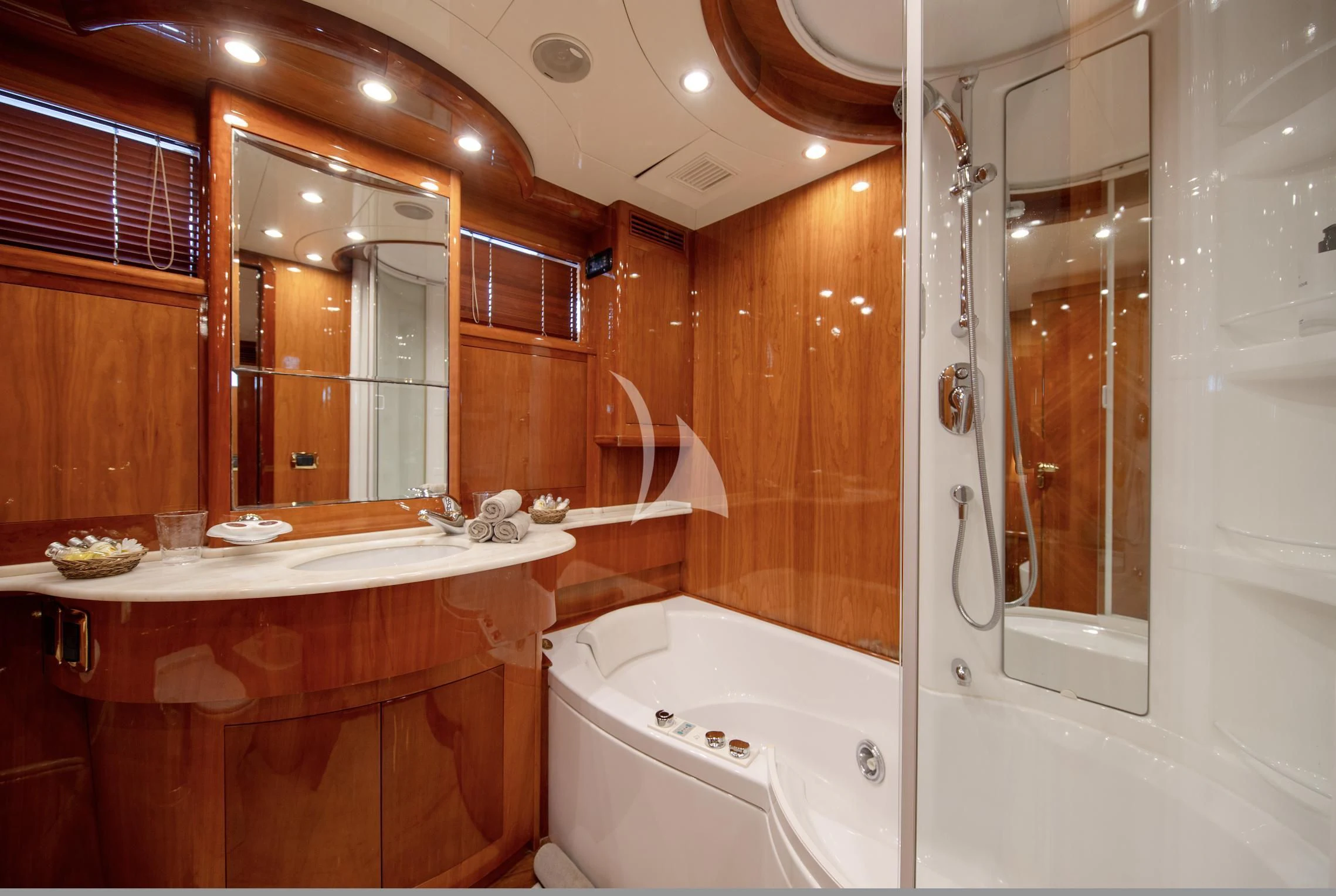 a bathroom with a bathtub and sink aboard BEIJA FLORE Yacht for Charter