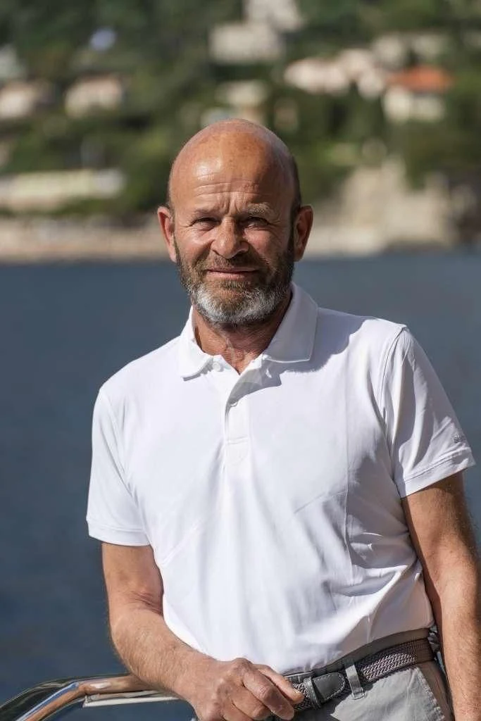 a man with a beard aboard BEIJA FLORE Yacht for Charter