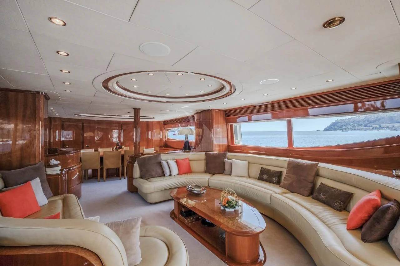 a living room with a large window aboard BEIJA FLORE Yacht for Charter