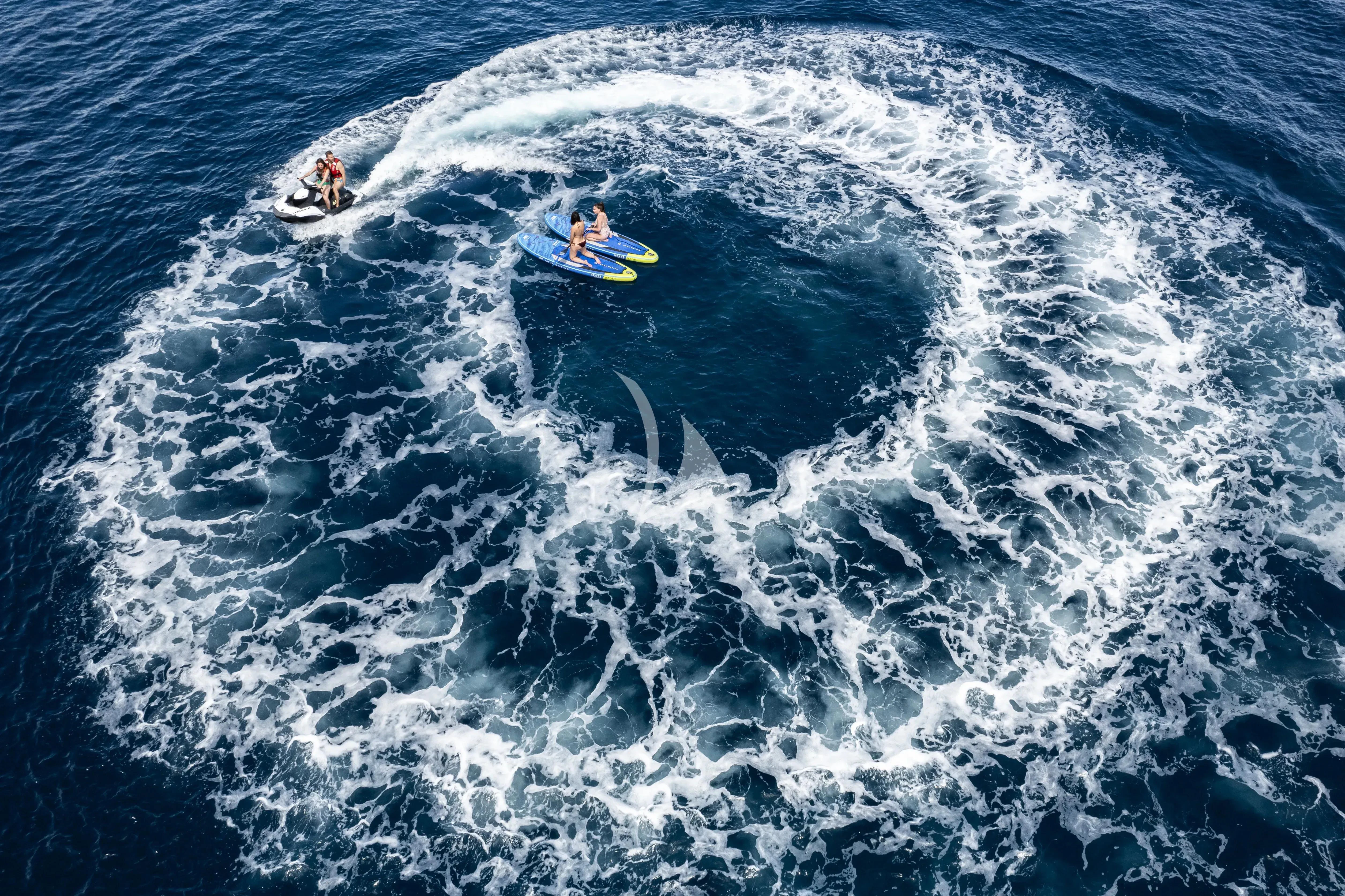 a couple of people on a boat aboard BEIJA FLORE Yacht for Charter