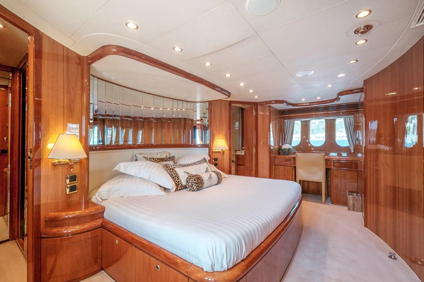 a large bedroom with a large bed aboard BEIJA FLORE Yacht for Charter