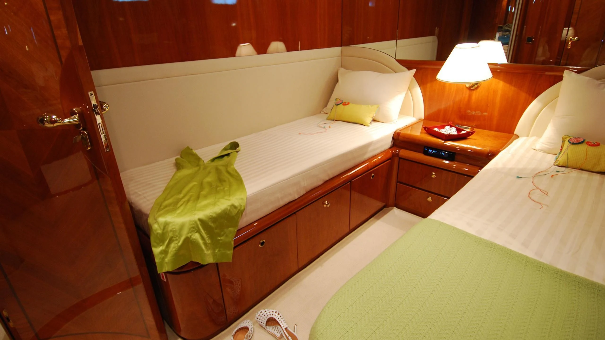 a couple of beds in a hotel room aboard BEIJA FLORE Yacht for Charter